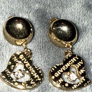 Preloved Givenchy post op earrings gold with rhinestone has stamp.